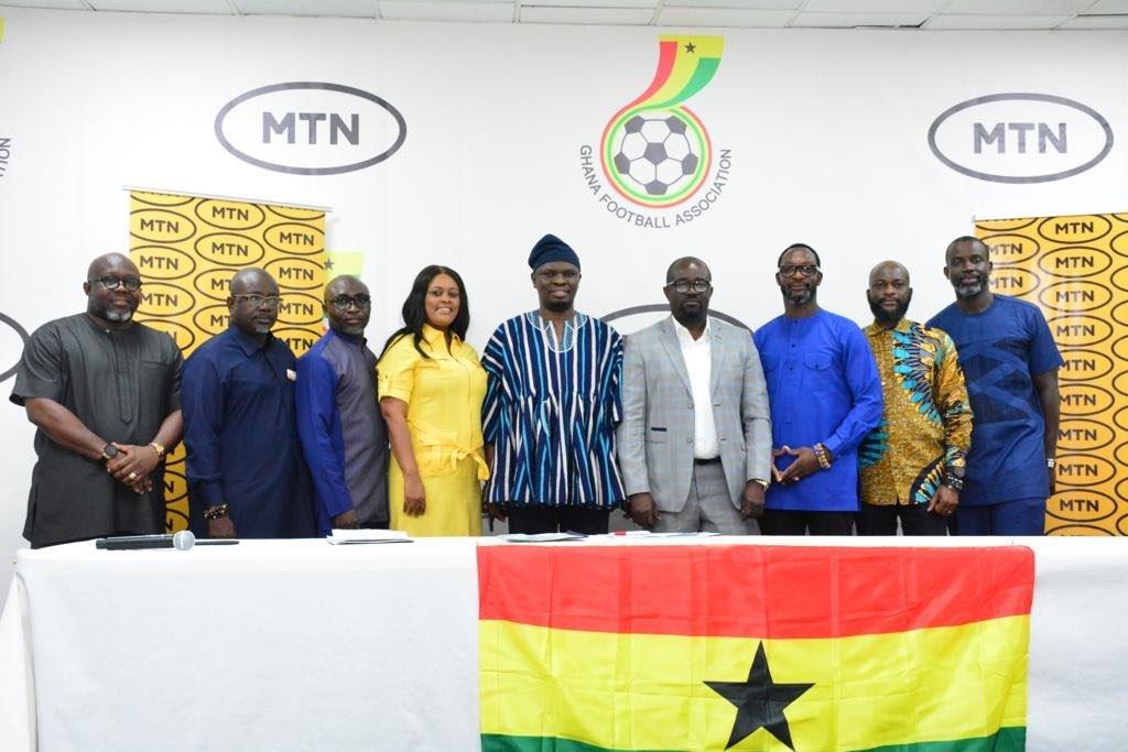 MIN.FOR SPORTS (MIDDLE) FLANKED BY GFA -MTN AND GOVERNMENT OFFICIALS AFTER THE SIGNING CEREMONY