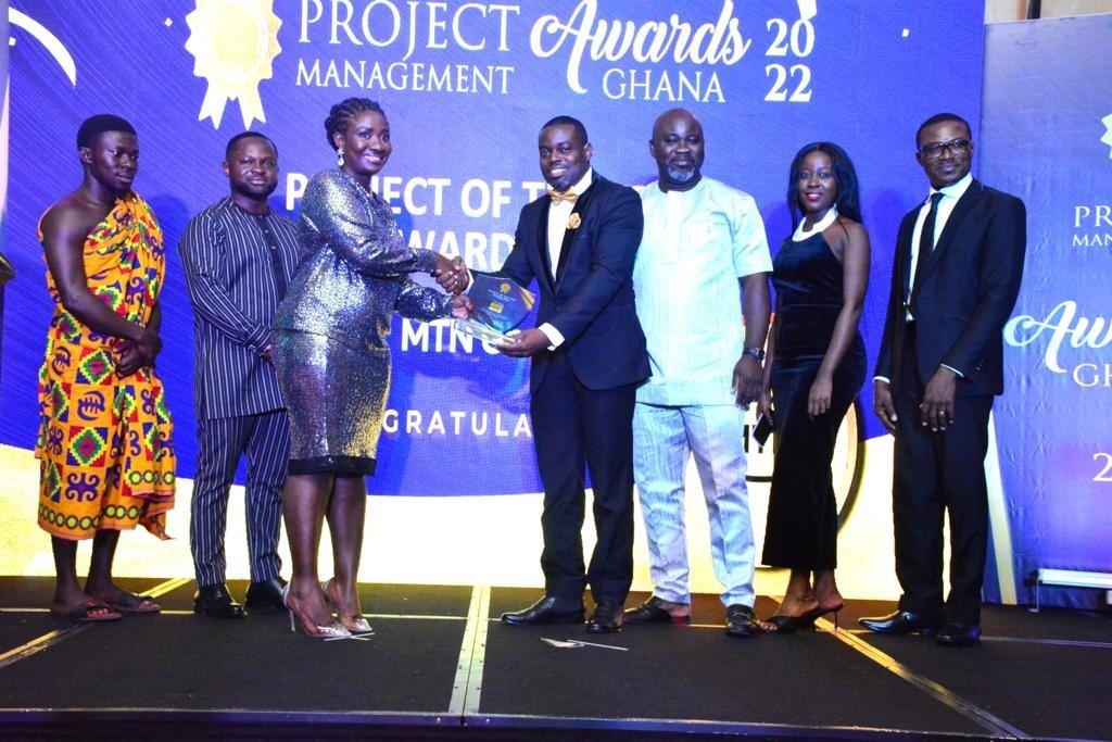 Emmanuel Afutu, Senior Manager, Base Station Subsystems (BSS) Implementation, receiving Project of the Year Award on behalf of MTN