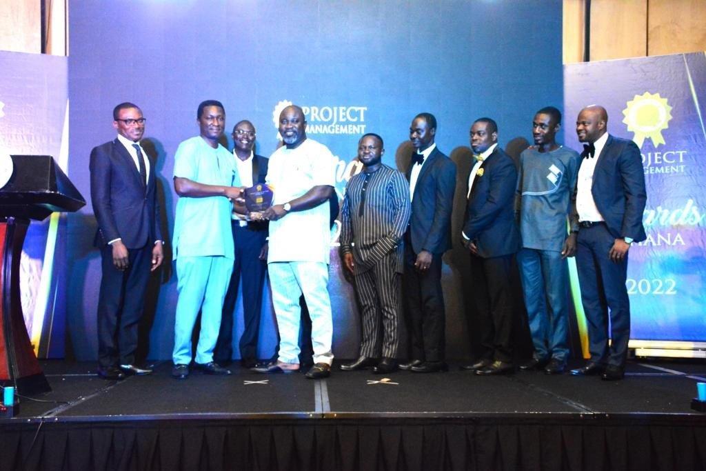Jerry Nyamekye, Senior Manager, Transmission Implementation receiving Project Team of the Year Award on behalf of MTN